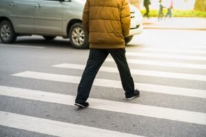 Someone using a zebra crossing