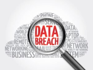A data breach compensation word cloud, with a magnifying glass over the middle of the cloud that has the words 'data breach' written in red.