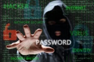 MASKED AND HOODED CYBER CRIMINAL WITH PASSWORD IN REACH, PROMPTING A POTENTIAL DATA BREACH CLAIM.