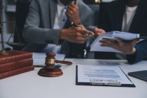 medical negligence solicitor and client discussing cosmetic surgery claims