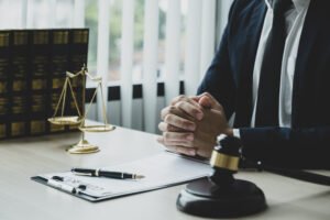 A solicitor works on a bank data breach compensation claim.