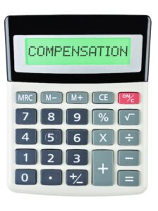 Compensation calculator with 'compensation' written on its green LED display