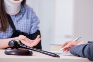 A specialist solicitor helps a client with their No Win No Fee personal injury claim