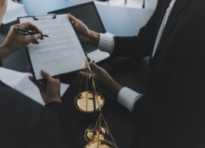 Specialist birth injury solicitors examine paperwork for clinical negligence claims 