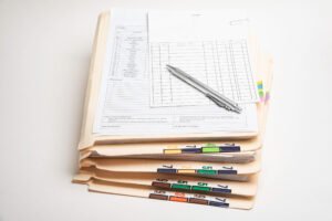 A pile of documents representing medical records