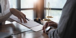 A solicitor helps a client to claim compensation after receiving negligent beauty treatment
