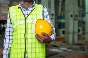 Agency worker with protective equipment 