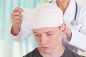 A man receives bandages after suffering a severe allergic reaction to hair dye.