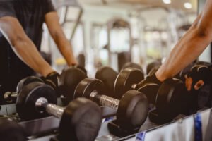 Gym users taking hold of free weights