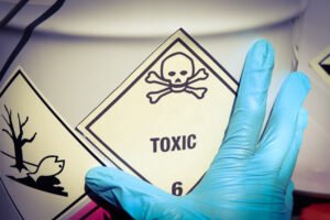 A chemical vat with a 'toxic' label on it.