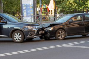 Two cars involved in a head-on collision.